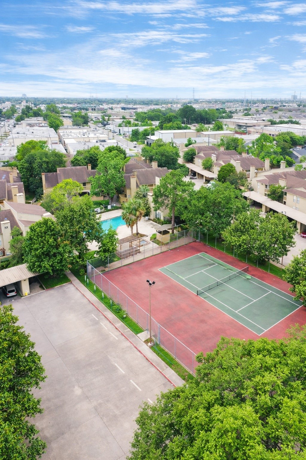 3546 Ocee Street Houston, TX 77063 - Photo 21 of 22 an aerial view of a tennis ground with a city view