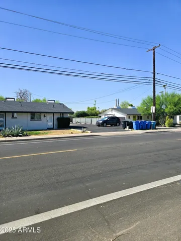 a view of a car parked on the road