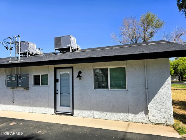 a front view of a house with a garage