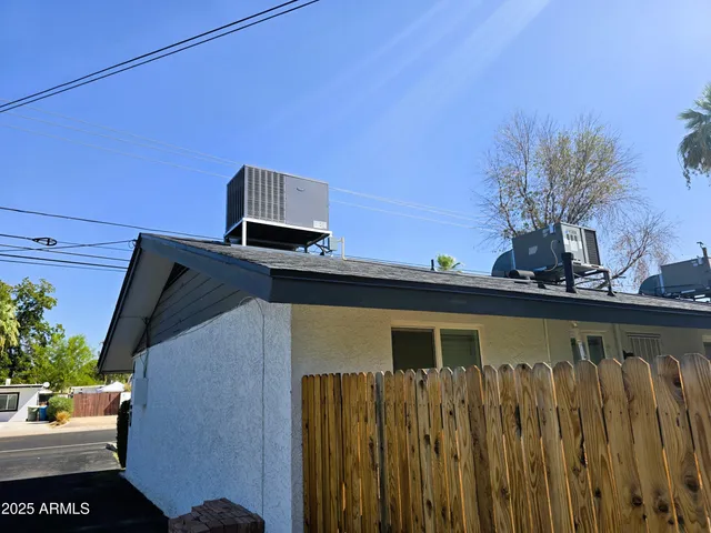 a view of house with a yard