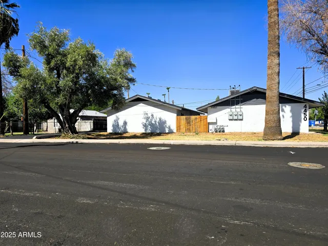 a view of a city street from a building