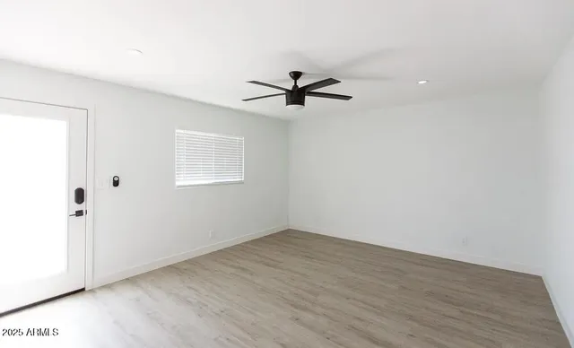 a bathroom with a toilet and shower