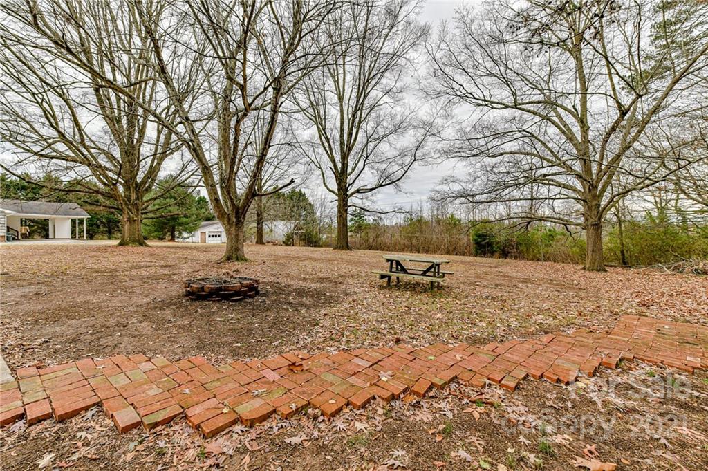 124 Baucom Deese Road Monroe, NC 28110 - Photo 23 of 26 a view of open space with trees