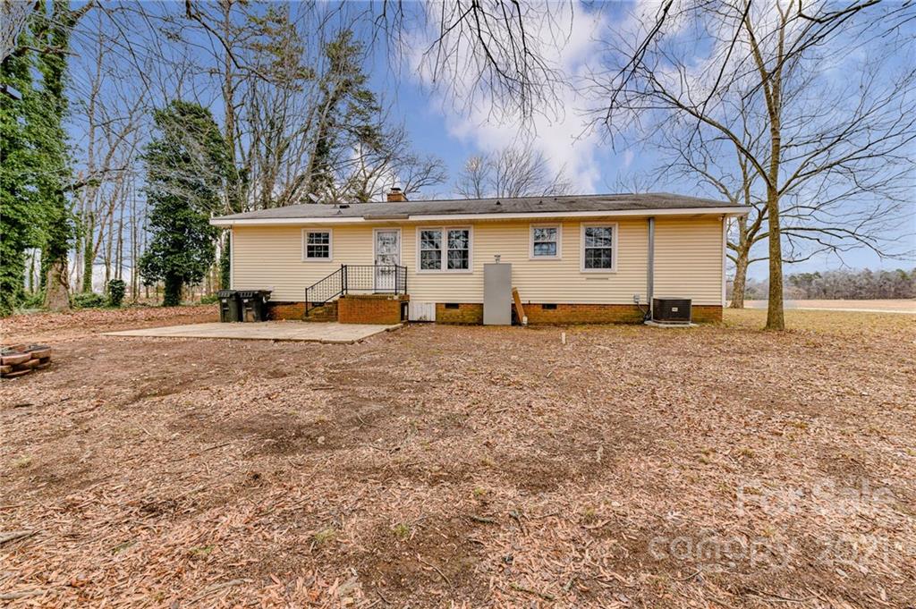 124 Baucom Deese Road Monroe, NC 28110 - Photo 26 of 26 a view of a house with a yard