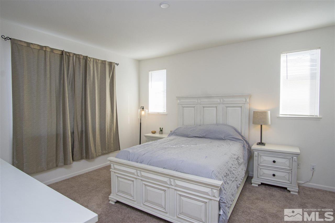 2090 Half Dome Drive Reno, NV 89521 - Photo 13 of 22 a bedroom with a bed and a closet
