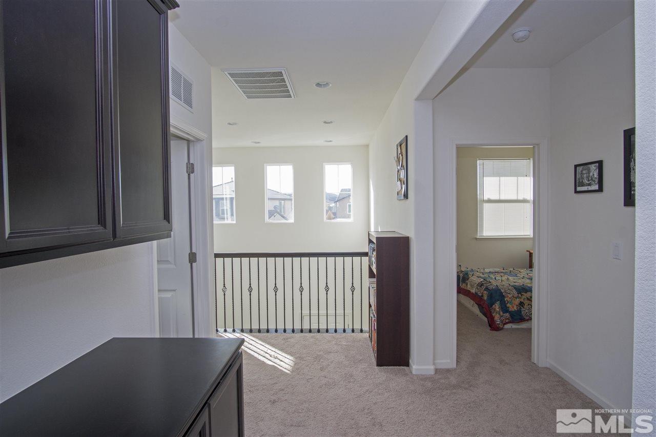 2090 Half Dome Drive Reno, NV 89521 - Photo 18 of 22 a view of a hallway with workspace