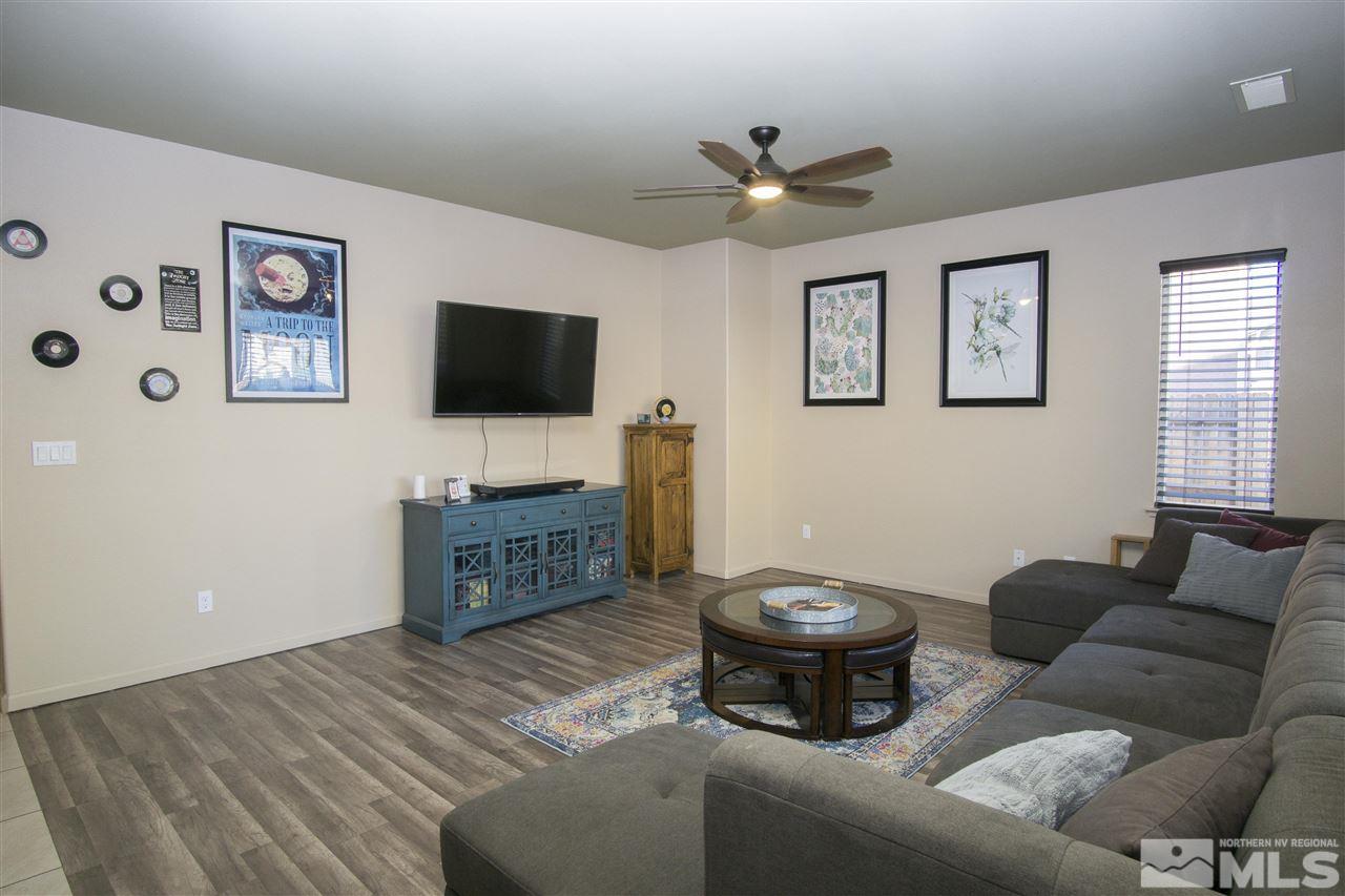 2090 Half Dome Drive Reno, NV 89521 - Photo 8 of 22 a living room with furniture and a flat screen tv