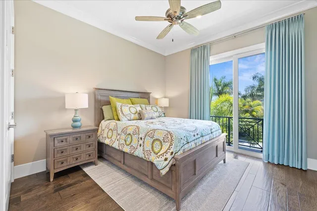 a bathroom with a granite countertop toilet a sink and a mirror