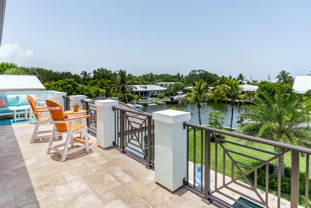 a view of a terrace with chairs