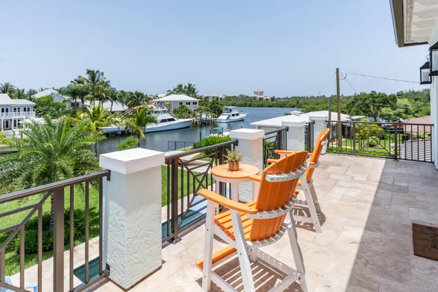 a outdoor space with patio the couches and a dining table with garden view