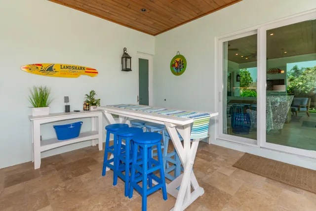 a view of a swimming pool with a patio