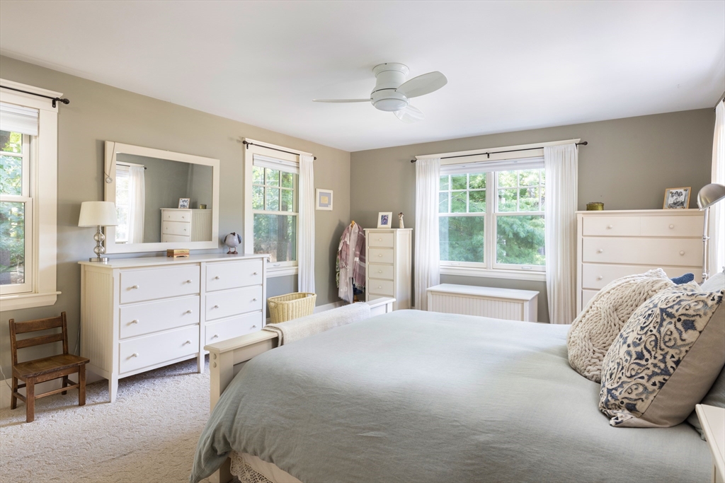 160 Allen Avenue Newton, MA 02468 - Photo 15 of 19 a bedroom with a bed and a dresser