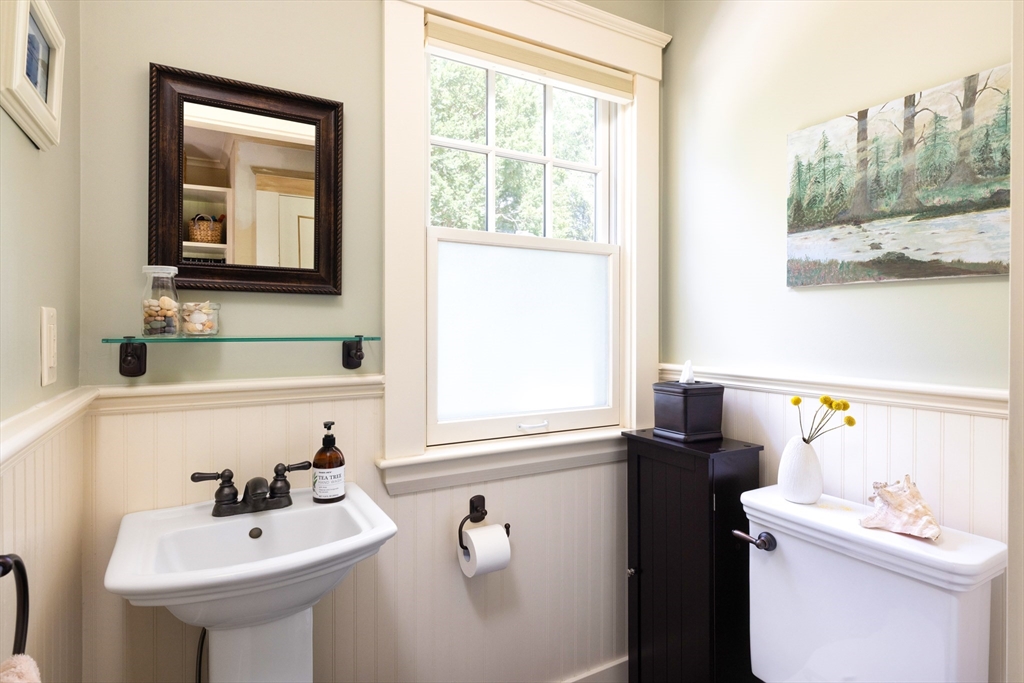 160 Allen Avenue Newton, MA 02468 - Photo 9 of 19 a bathroom with a sink a toilet and a mirror