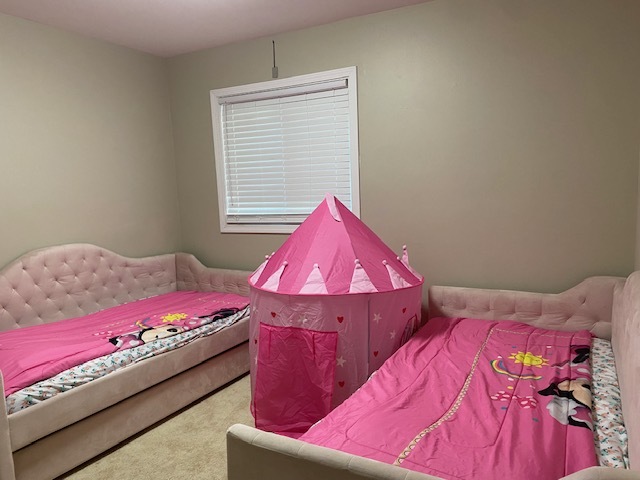 125 West Elk Trail, Unit 124 Carol Stream, IL 60188 - Photo 8 of 9 a bedroom with a bed and a dresser