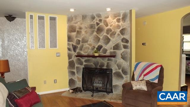 1 Brougham Road Palmyra, VA 22963 - Photo 3 of 50 a living room with furniture and a fireplace