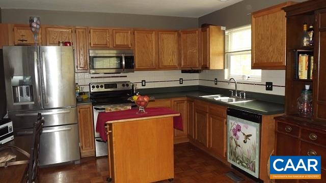 1 Brougham Road Palmyra, VA 22963 - Photo 5 of 50 a kitchen with a refrigerator stove and sink