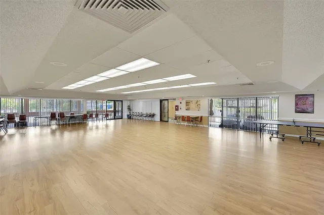 a view of house with outdoor space and swimming pool