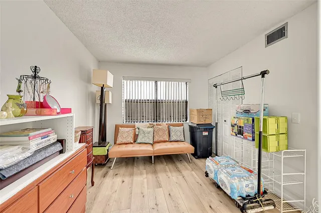 a room with musical instruments and a large window