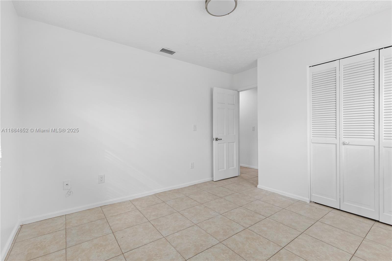 1517 Southeast Pitcher Road Port St. Lucie, FL 34952 - Photo 17 of 26 a view of an empty room