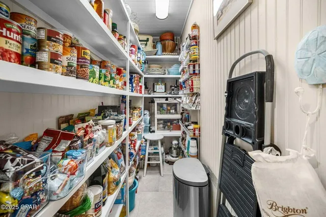 a bathroom with a sink toilet and mirror