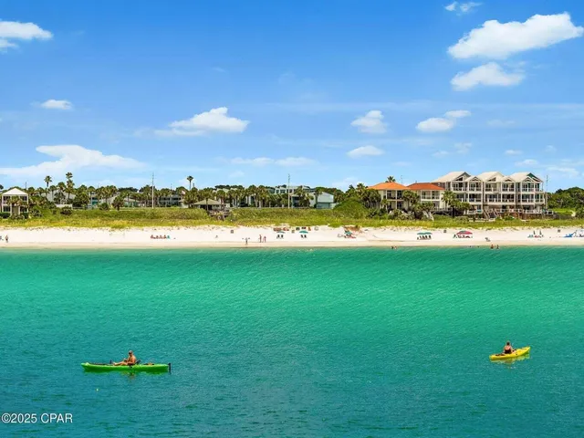 a view of a city with an ocean view