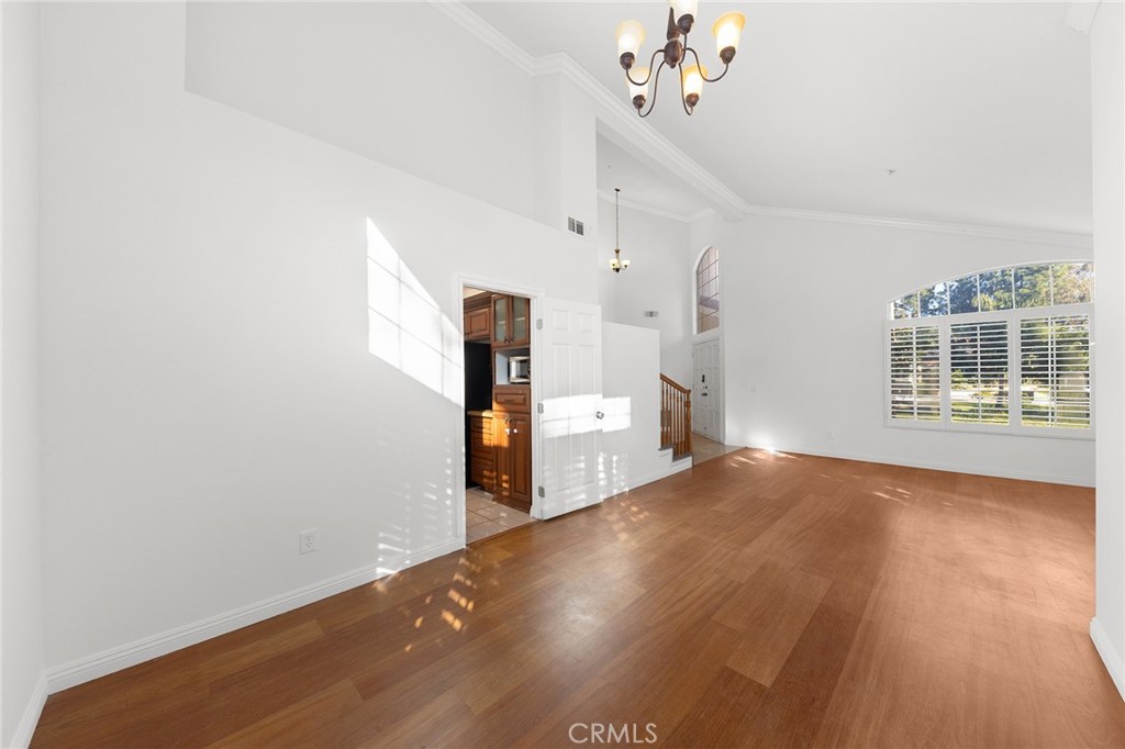 6598 Bradford Court Rancho Cucamonga, CA 91701 - Photo 11 of 48 a view of a room with wooden floor