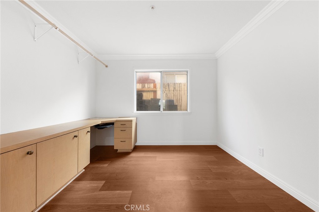6598 Bradford Court Rancho Cucamonga, CA 91701 - Photo 23 of 48 a view of a kitchen with white cabinets