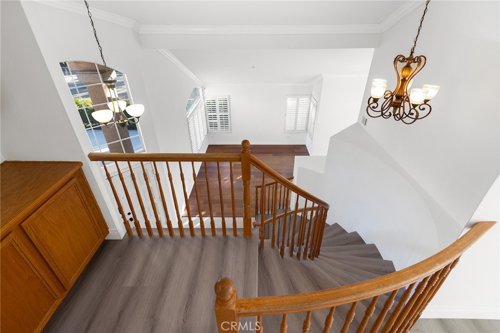 6598 Bradford Court Rancho Cucamonga, CA 91701 - Photo 27 of 48 a view of entryway and hall with wooden floor