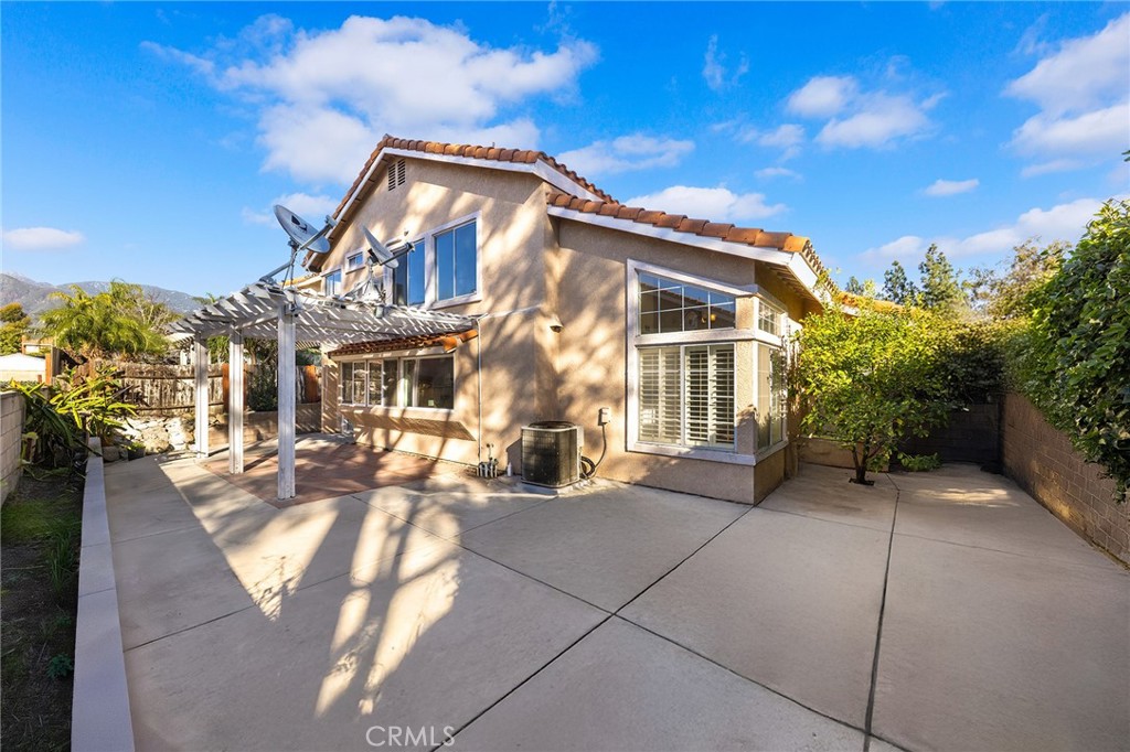 6598 Bradford Court Rancho Cucamonga, CA 91701 - Photo 39 of 48 a view of a house with a yard