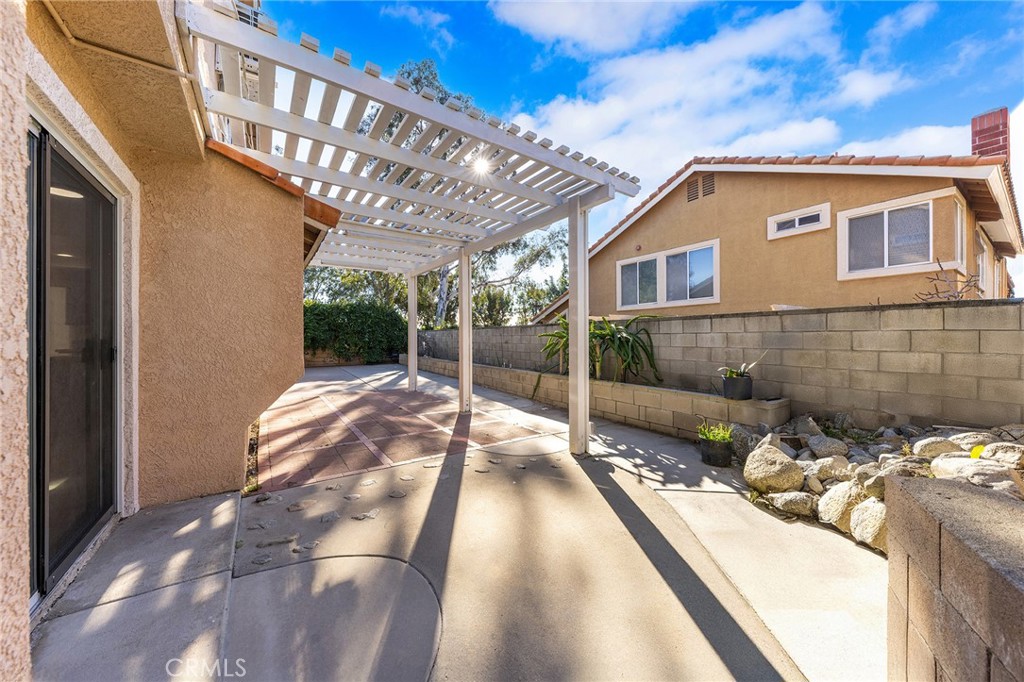 6598 Bradford Court Rancho Cucamonga, CA 91701 - Photo 43 of 48 a view of a house with backyard and porch