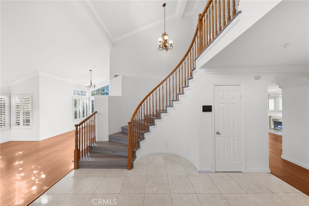 6598 Bradford Court Rancho Cucamonga, CA 91701 - Photo 6 of 48 a view of entryway and hall with a front door
