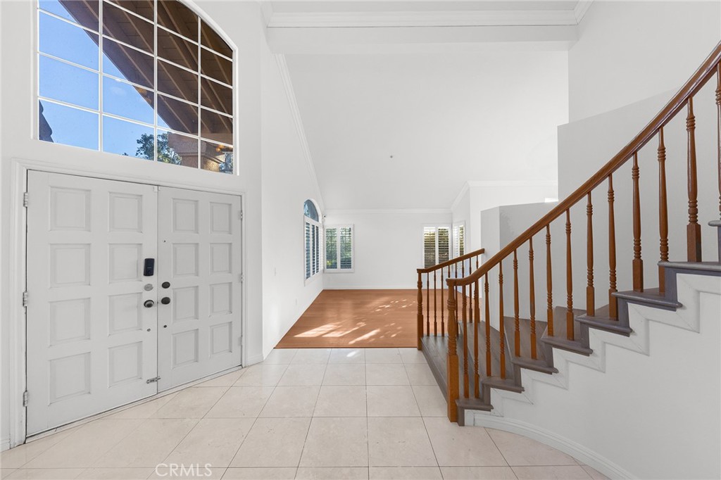 6598 Bradford Court Rancho Cucamonga, CA 91701 - Photo 7 of 48 a view of entryway with stairs and windows