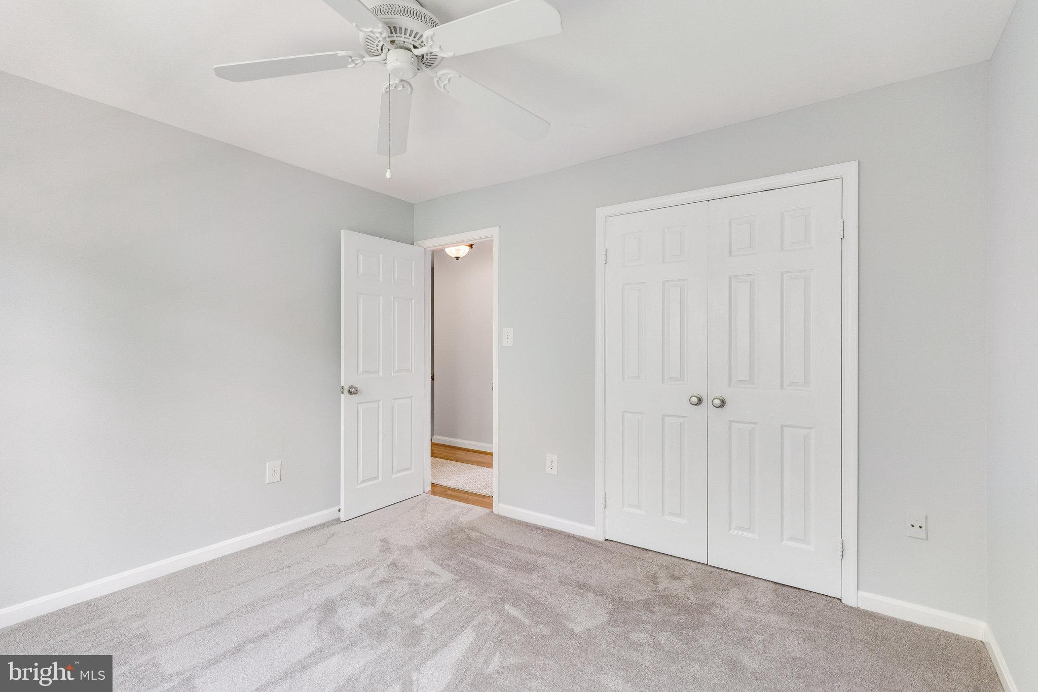 8314 Graceway Drive Lorton, VA 22079 - Photo 45 of 64 a view of an empty room and chandelier fan