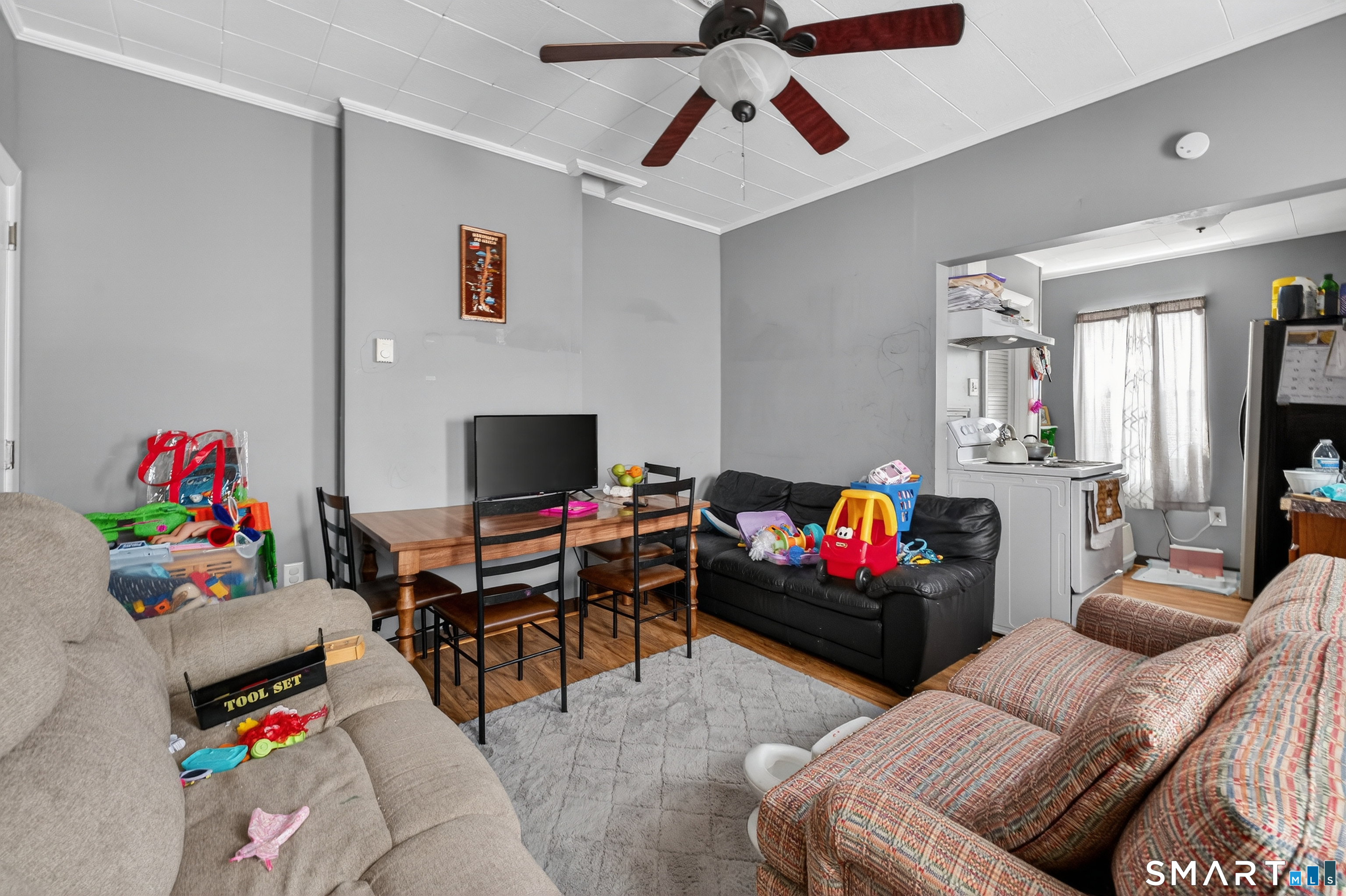 259 Yantic Street Norwich, CT 06360 - Photo 2 of 19 a living room with furniture and a flat screen tv