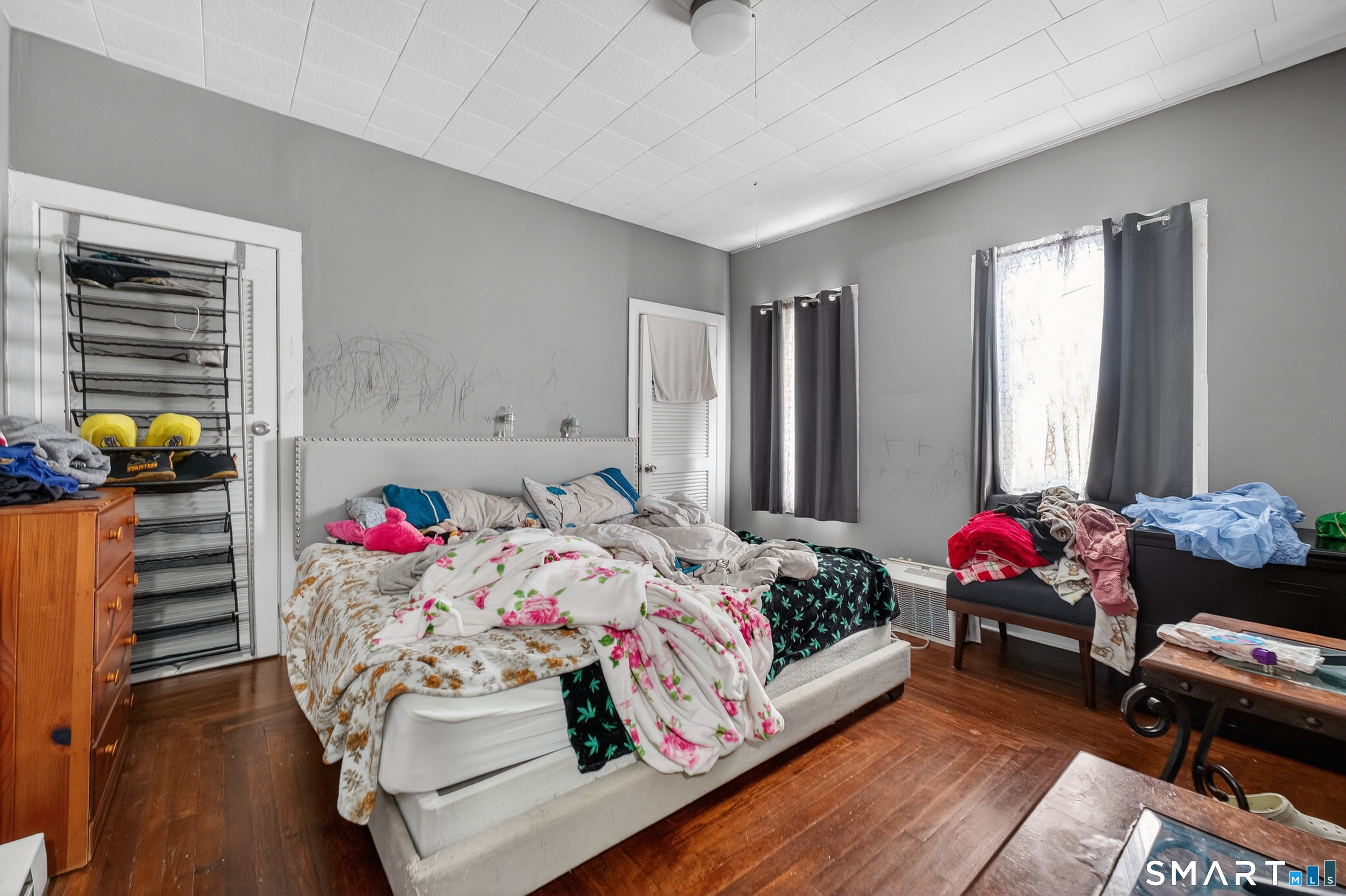 259 Yantic Street Norwich, CT 06360 - Photo 7 of 19 a bedroom with bed and a couch