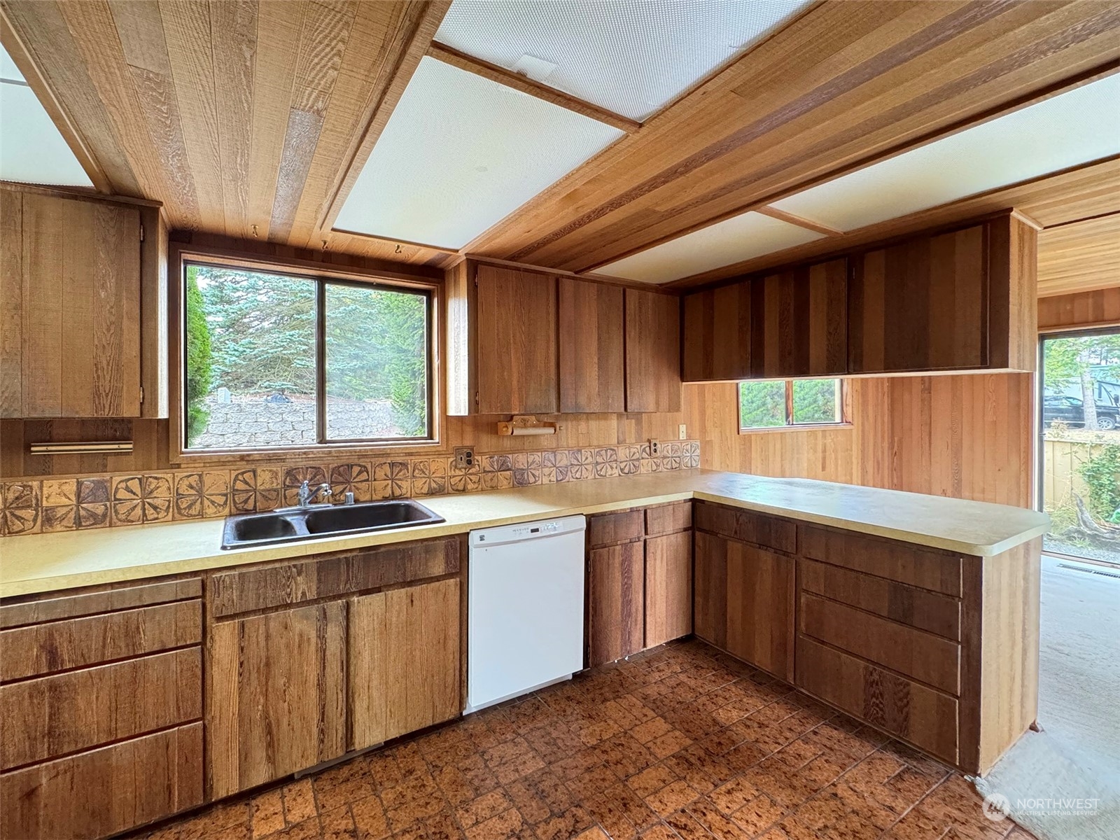 51 Huckleberry Circle Sequim, WA 98382 - Photo 12 of 40 a kitchen with sink and window