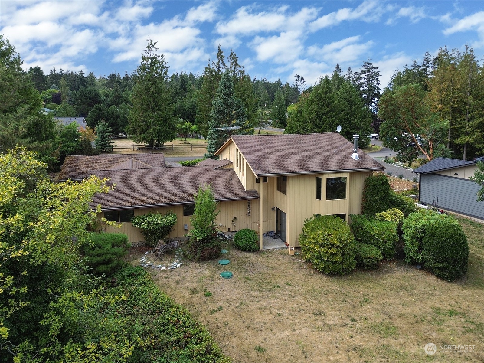 51 Huckleberry Circle Sequim, WA 98382 - Photo 2 of 40 an aerial view of a house
