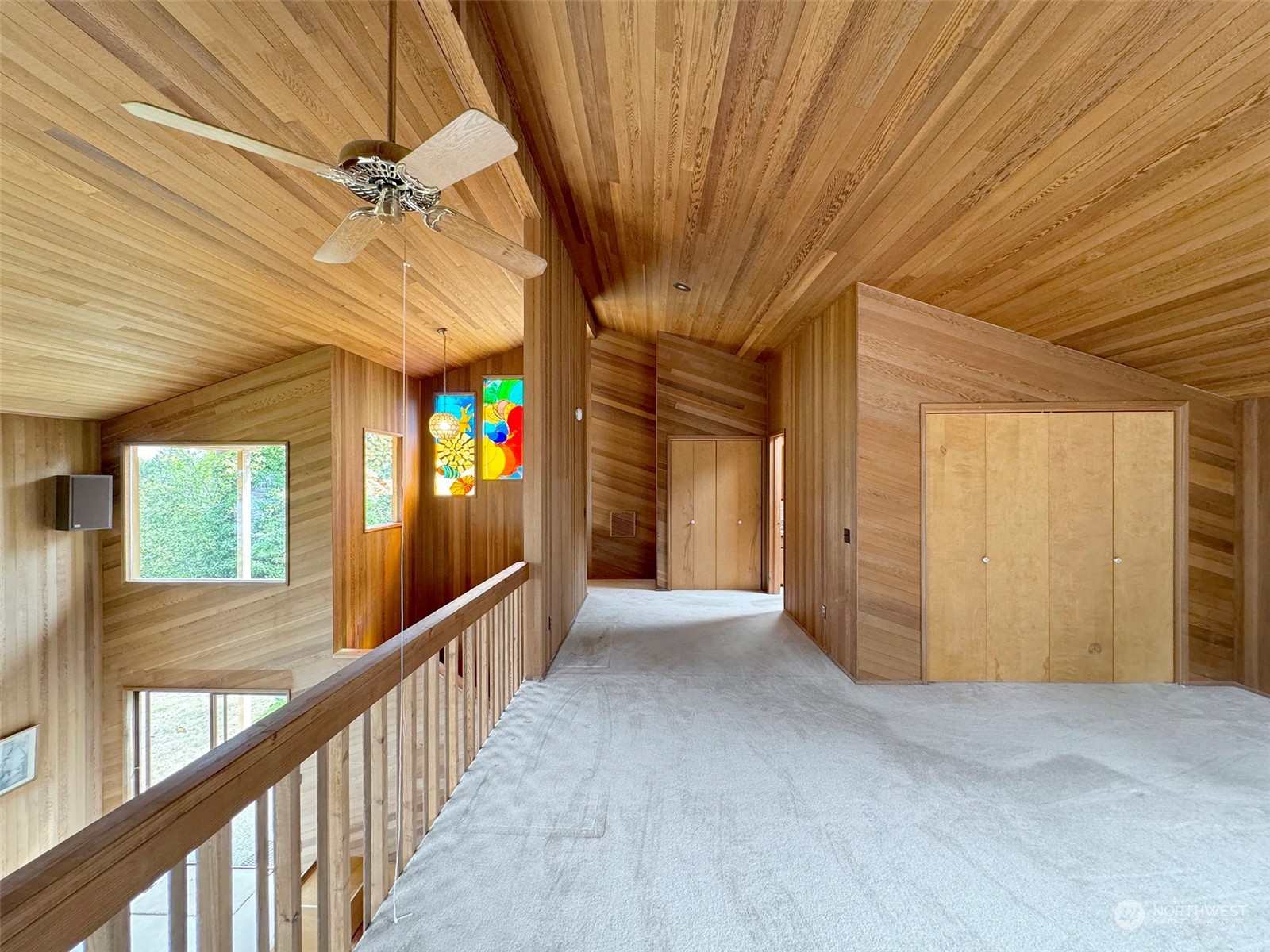 51 Huckleberry Circle Sequim, WA 98382 - Photo 21 of 40 a view of a hallway with wooden floor and staircase