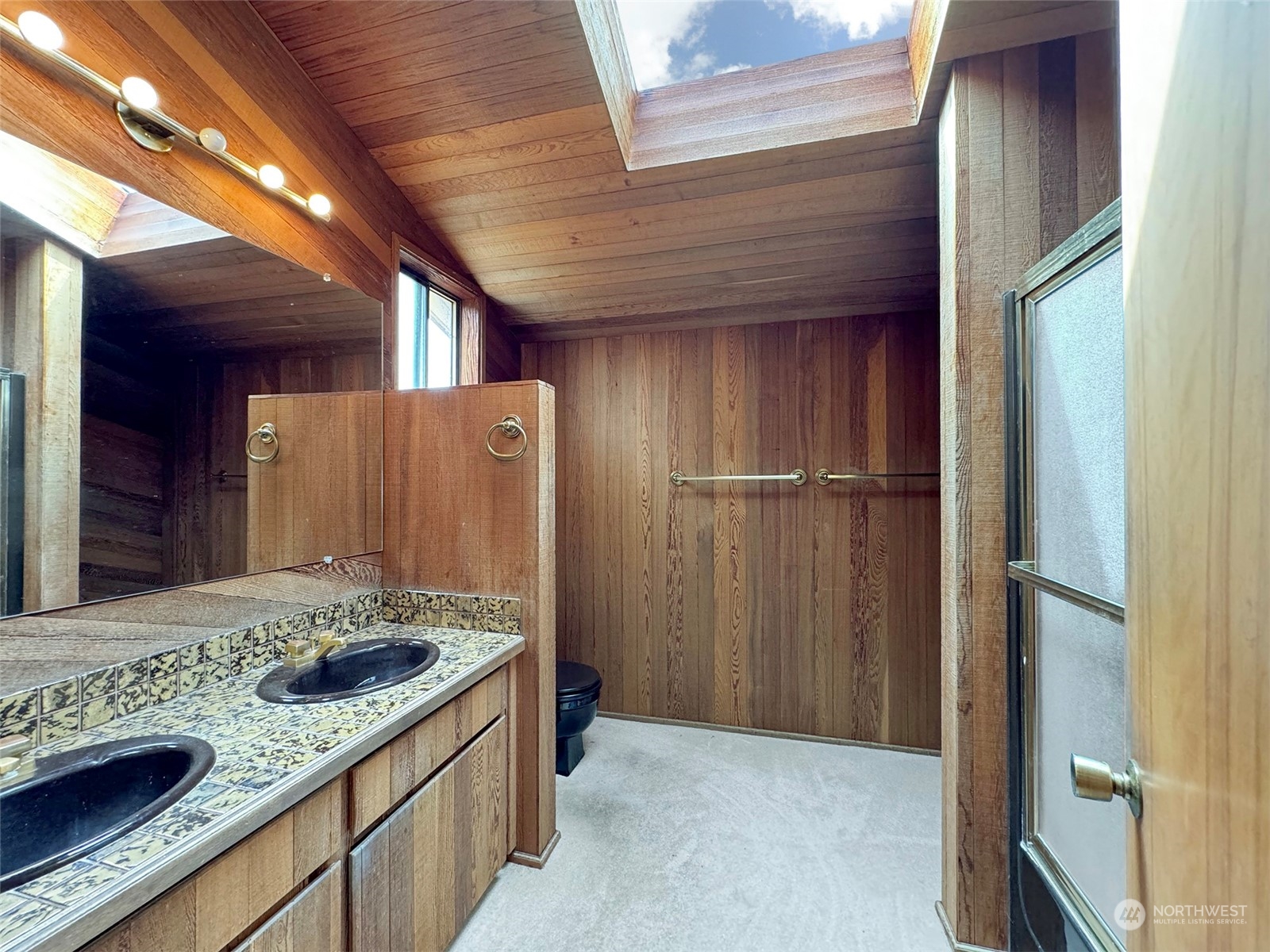 51 Huckleberry Circle Sequim, WA 98382 - Photo 22 of 40 a bathroom with a granite countertop sink and a mirror