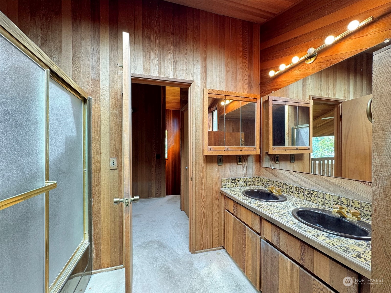 51 Huckleberry Circle Sequim, WA 98382 - Photo 24 of 40 a kitchen with stainless steel appliances granite countertop wooden cabinets and a stove