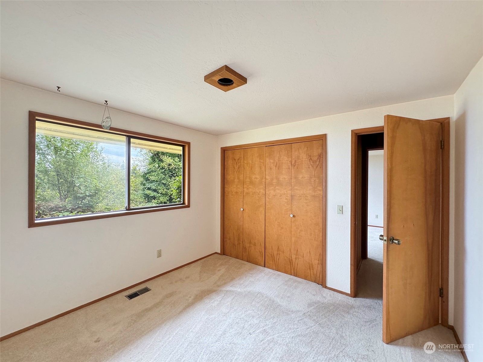 51 Huckleberry Circle Sequim, WA 98382 - Photo 26 of 40 a view of an empty room with a window