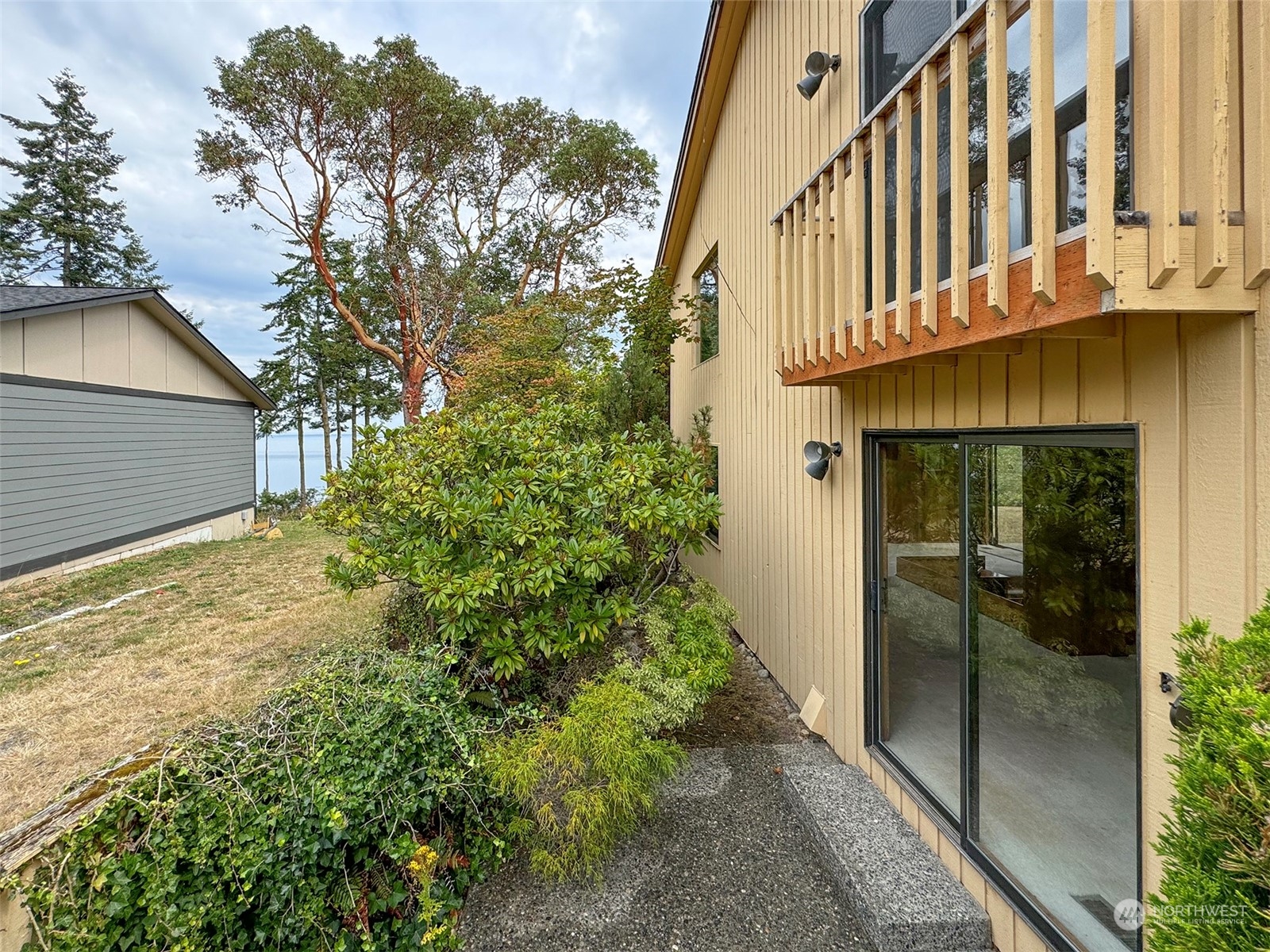 51 Huckleberry Circle Sequim, WA 98382 - Photo 34 of 40 a view of a house with a tree
