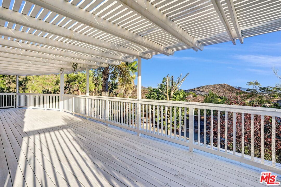 24383 Topacio Court Wildomar, CA 92595 - Photo 27 of 39 a view of a balcony with wooden floor