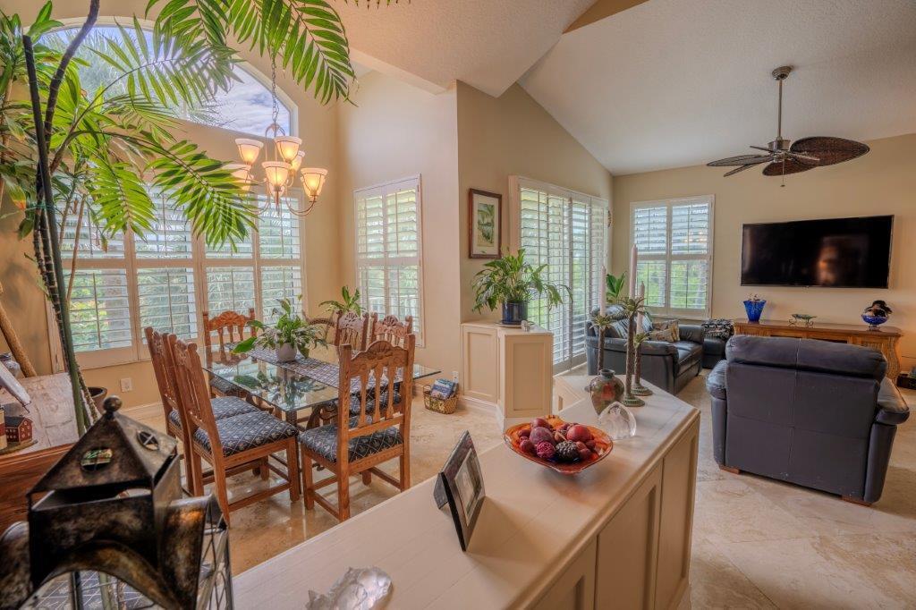 708 Mainsail Circle Jupiter, FL 33477 - Photo 23 of 68 a living room with furniture and a flat screen tv