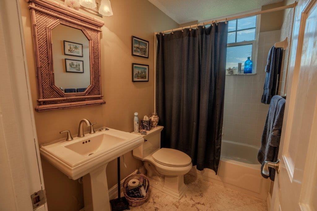 708 Mainsail Circle Jupiter, FL 33477 - Photo 40 of 68 a bathroom with a sink toilet and shower