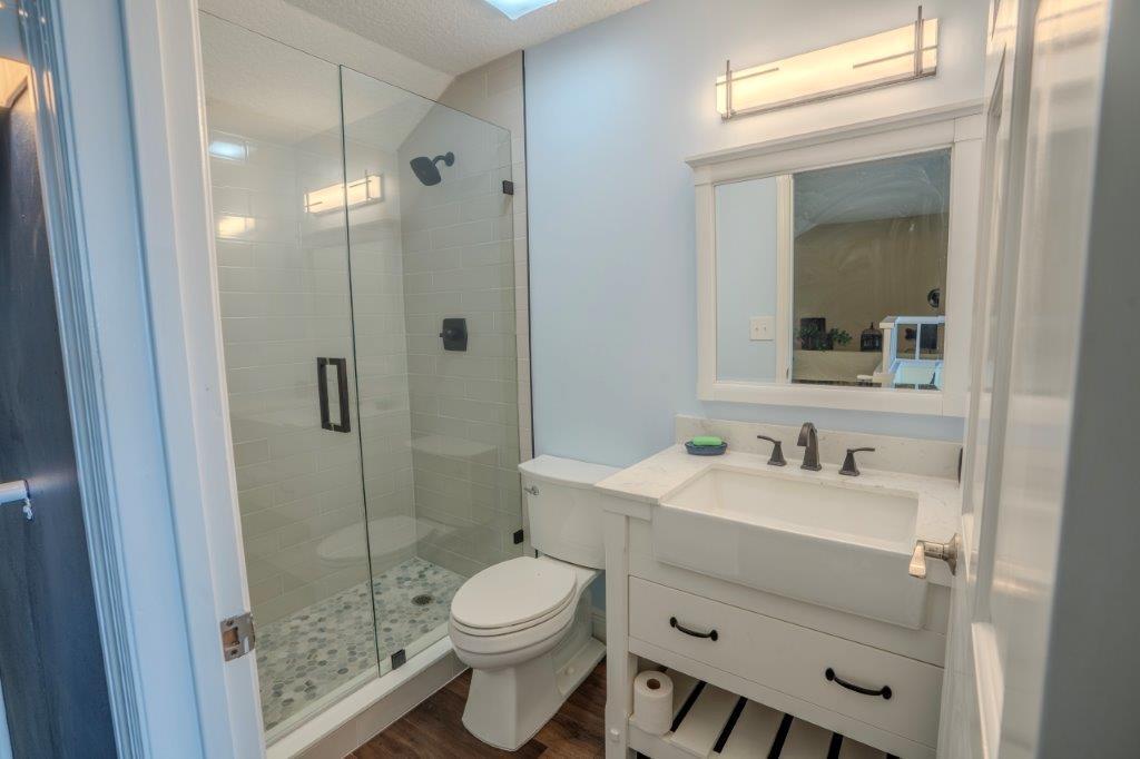 708 Mainsail Circle Jupiter, FL 33477 - Photo 45 of 68 a bathroom with a sink a toilet and shower