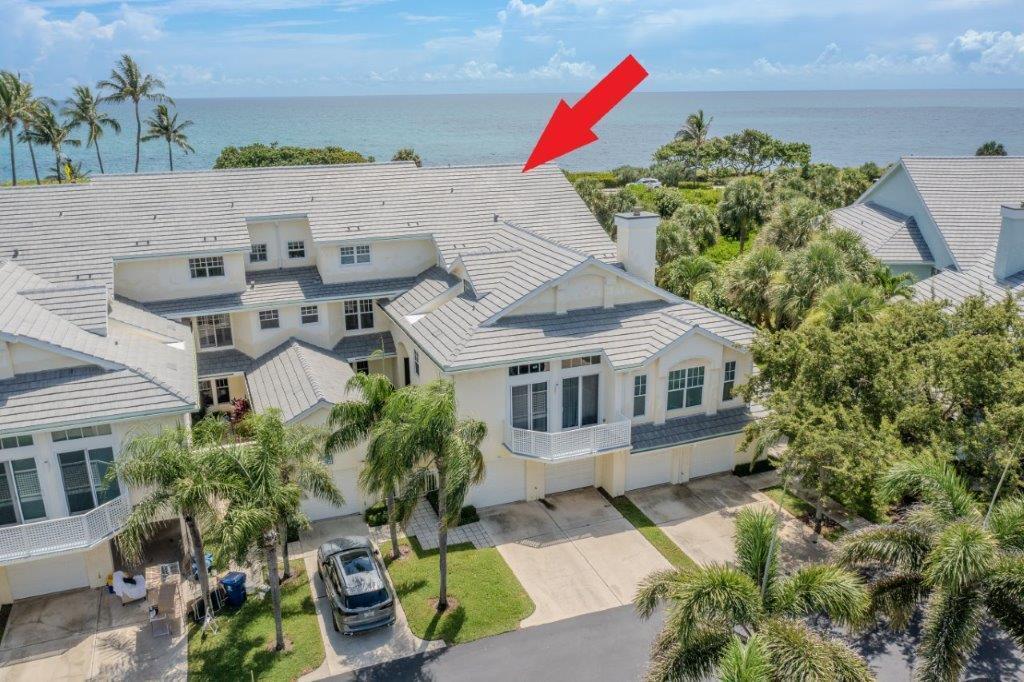 708 Mainsail Circle Jupiter, FL 33477 - Photo 49 of 68 an aerial view of a house with a yard