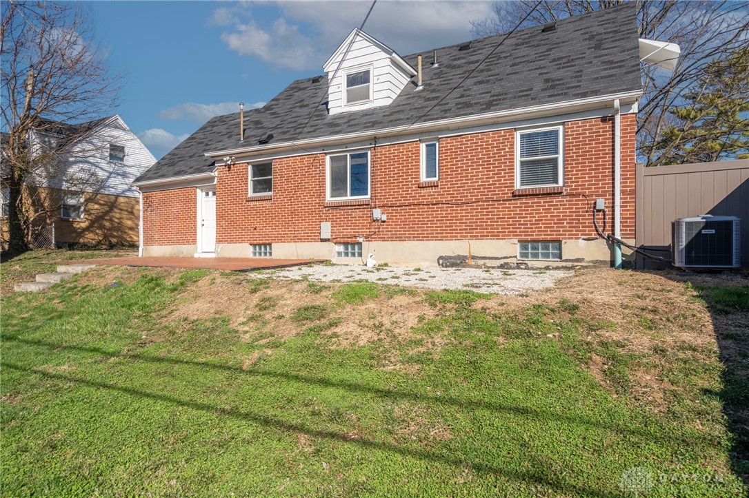326 North Bromfield Road Kettering, OH 45429 - Photo 29 of 30 This brick residence features a spacious yard and inviting patio area, ideal for outdoor enjoyment.