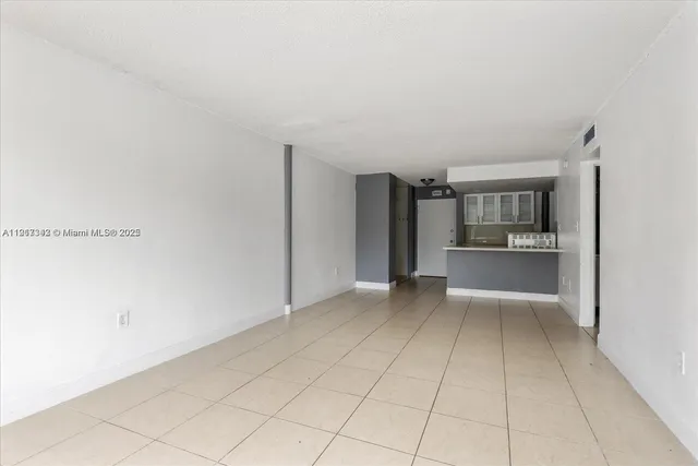 swimming pool view with a seating space