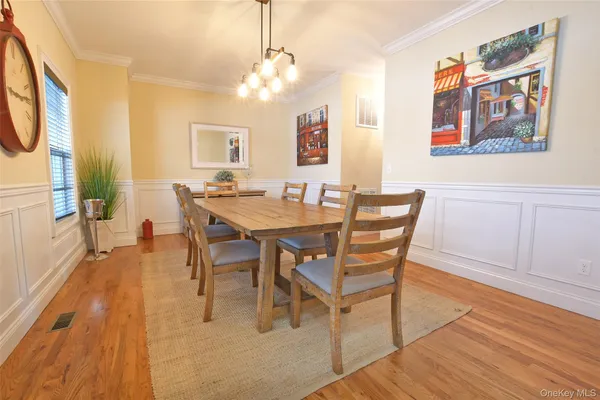 a kitchen with stainless steel appliances granite countertop a stove microwave and refrigerator